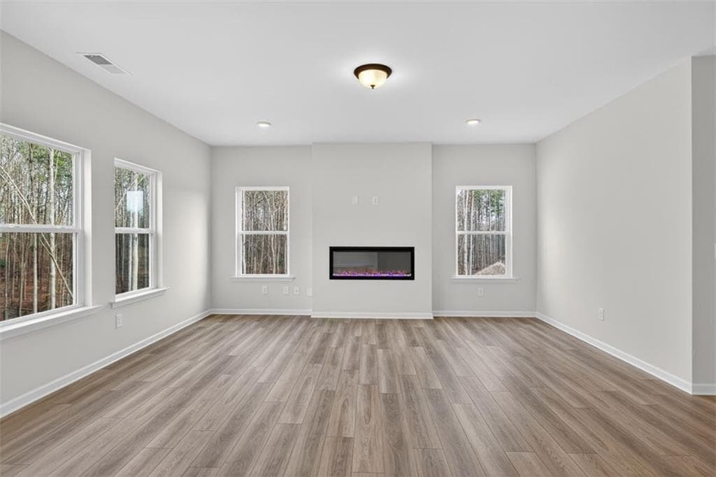4 bedroom, 3 bathroom, 2,565 sq ft single family residence for sale at 550 Grover Street, Hoschton, GA 30548 — photo 7