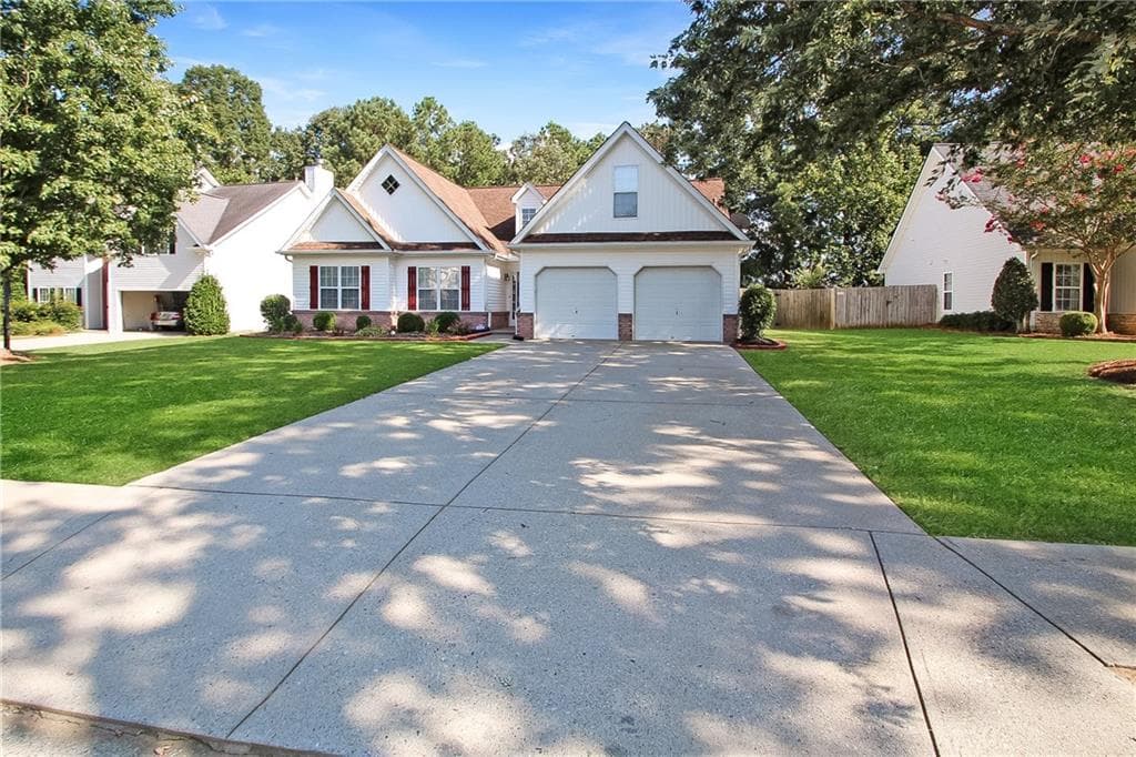 4 bedroom, 2 bathroom, 1,919 sq ft single family residence for rent at 509 Tannenhill Place, Sugar Hill, GA 30518 for $2,550 a month — photo 1 of 28