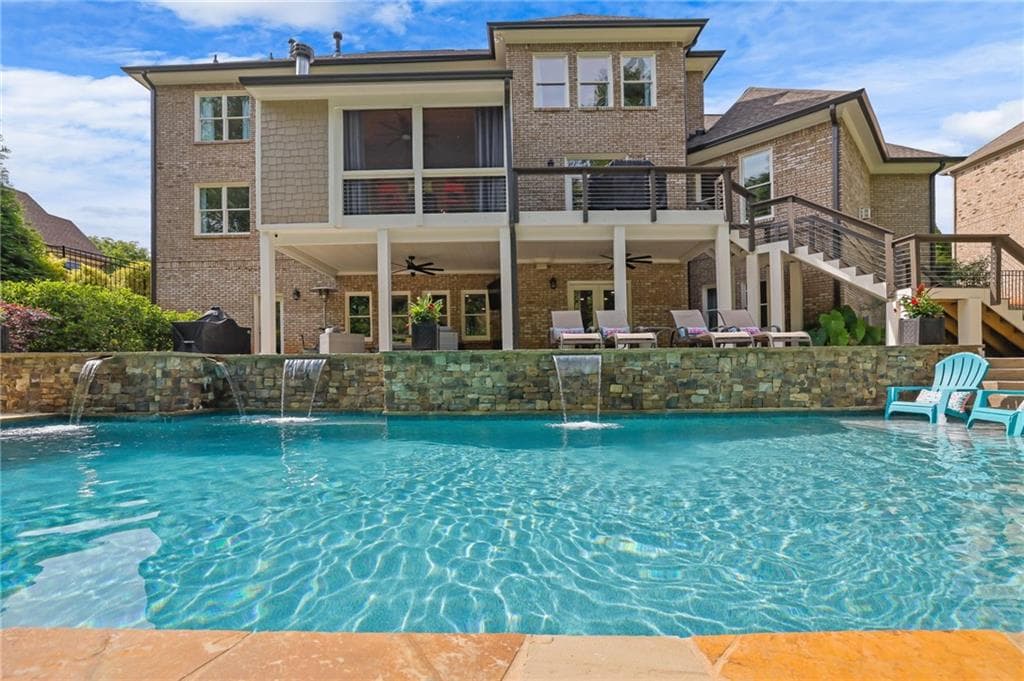 6 bedroom, 5 bathroom, 6,263 sq ft single family residence sold at 3975 Carissa Trace, Cumming, GA 30040