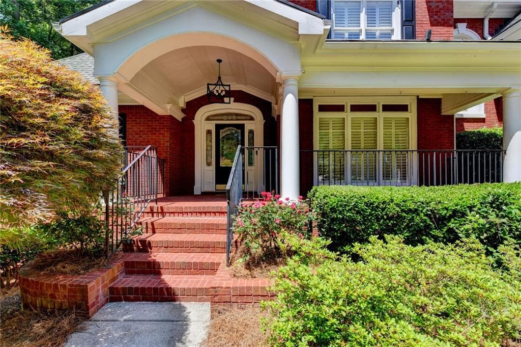 5 bedroom, 5 bathroom, 6,753 sq ft single family residence for sale at 7040 Laurel Oak Drive, Suwanee, GA 30024 — photo 3