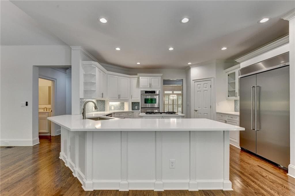 5 bedroom, 5 bathroom, 6,753 sq ft single family residence for sale at 7040 Laurel Oak Drive, Suwanee, GA 30024 — photo 10