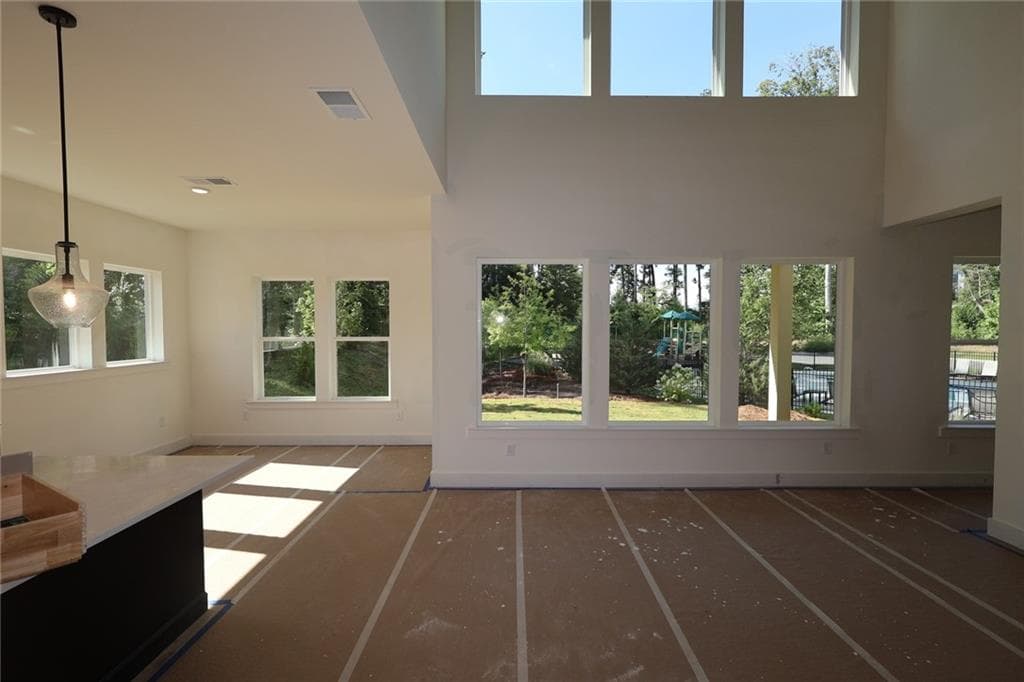 5 bedroom, 4 bathroom, 3,109 sq ft single family residence for sale at 4585 Beechnut Circle, Cumming, GA 30028 — photo 6