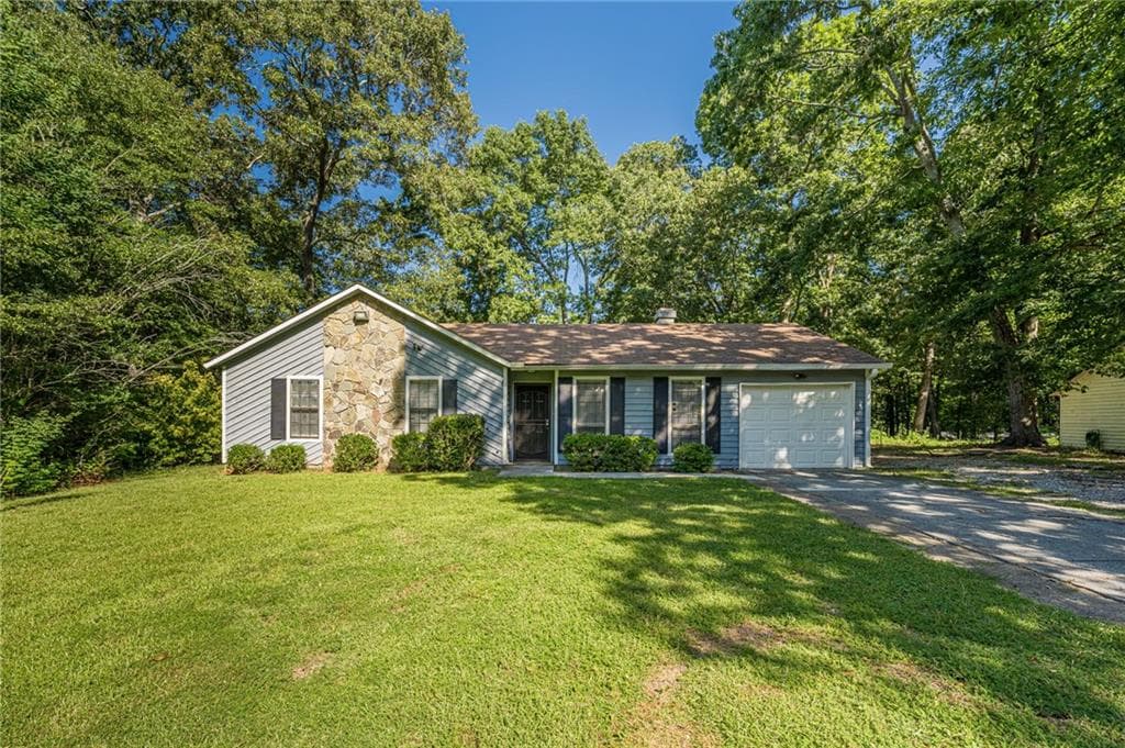 3 bedroom, 2 bathroom, 1,212 sq ft home for sale at 5350 Greenhedge Trail, Stone Mountain, GA