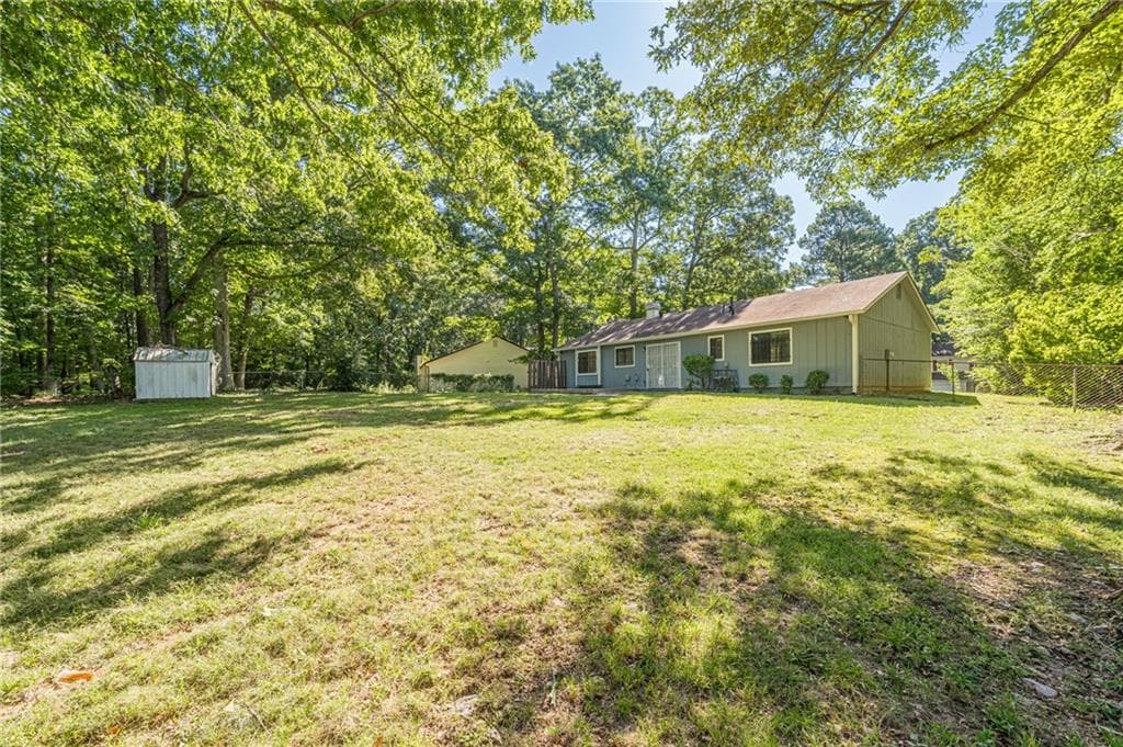 3 bedroom, 2 bathroom, 1,212 sq ft single family residence for sale at 5350 Greenhedge Trail, Stone Mountain, GA 30088 — photo 3