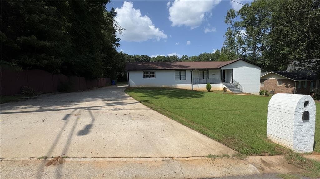 4 bedroom, 3 bathroom, 2,730 sq ft home for sale at 1050 Forest Heights Road, Stone Mountain, GA