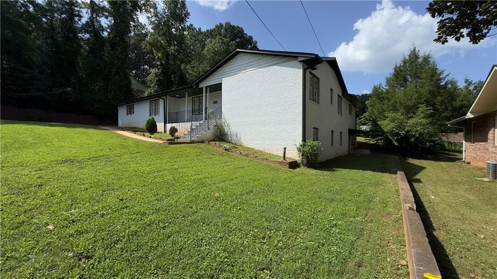 4 bedroom, 3 bathroom, 2,730 sq ft single family residence for sale at 1050 Forest Heights Road, Stone Mountain, GA 30083 — photo 3