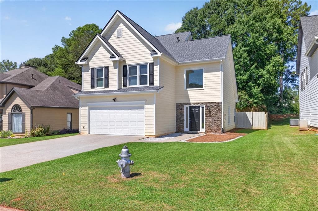 3 bedroom, 3 bathroom, 1,781 sq ft single family residence for sale at 1975 Watercrest Circle, Lawrenceville, GA 30043 — photo 2