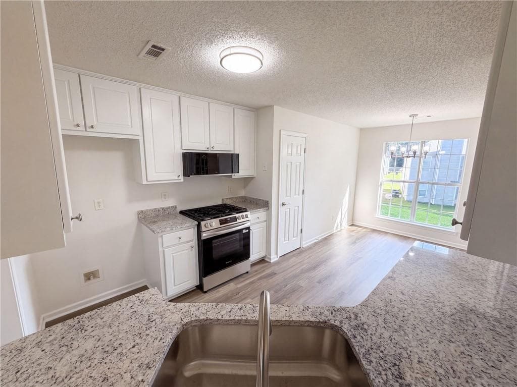 3 bedroom, 2 bathroom, 1,498 sq ft single family residence for sale at 1088 Meadow Glen Circle, Fairburn, GA 30213 — photo 2