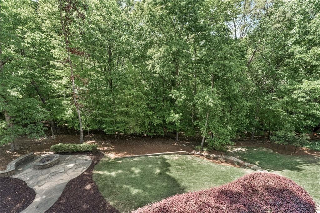 6 bedroom, 5 bathroom, 4,655 sq ft single family residence for sale at 175 Woodcliff Drive, Suwanee, GA 30024 — photo 2