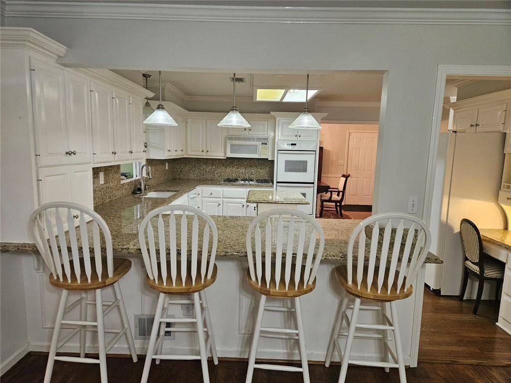 4 bedroom, 3 bathroom, 2,719 sq ft single family residence for sale at 2982 Moorings Parkway, Snellville, GA 30039 — photo 8