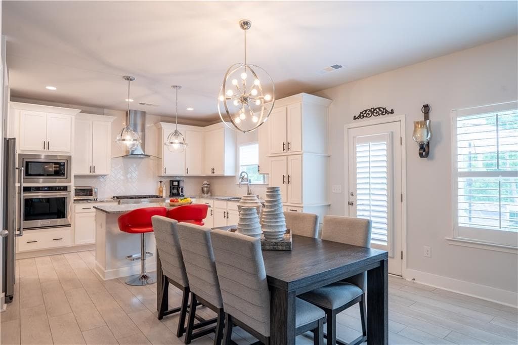 5 bedroom, 4 bathroom, 3,286 sq ft single family residence for sale at 6110 Banyan Trail, Cumming, GA 30028 — photo 3