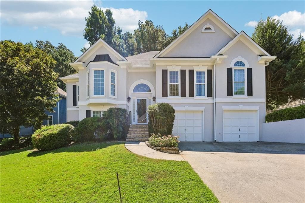 4 bedroom, 3 bathroom, 2,579 sq ft single family residence for sale at 4104 Dream Catcher Drive, Woodstock, GA 30189