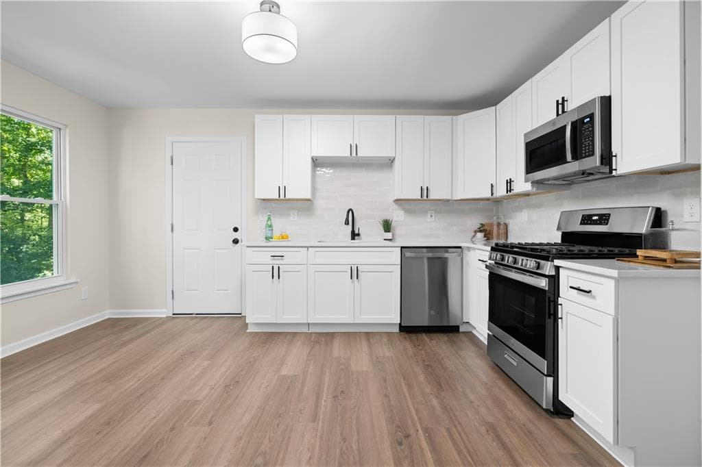 4 bedroom, 3 bathroom, 2,354 sq ft single family residence for sale at 1550 Olde Mill Court, Marietta, GA 30066 — photo 9