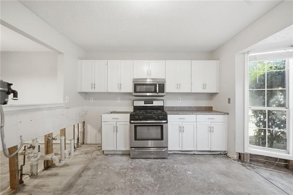 3 bedroom, 3 bathroom, 2,515 sq ft single family residence for sale at 5145 N Bridges Drive, Johns Creek, GA 30022 — photo 9