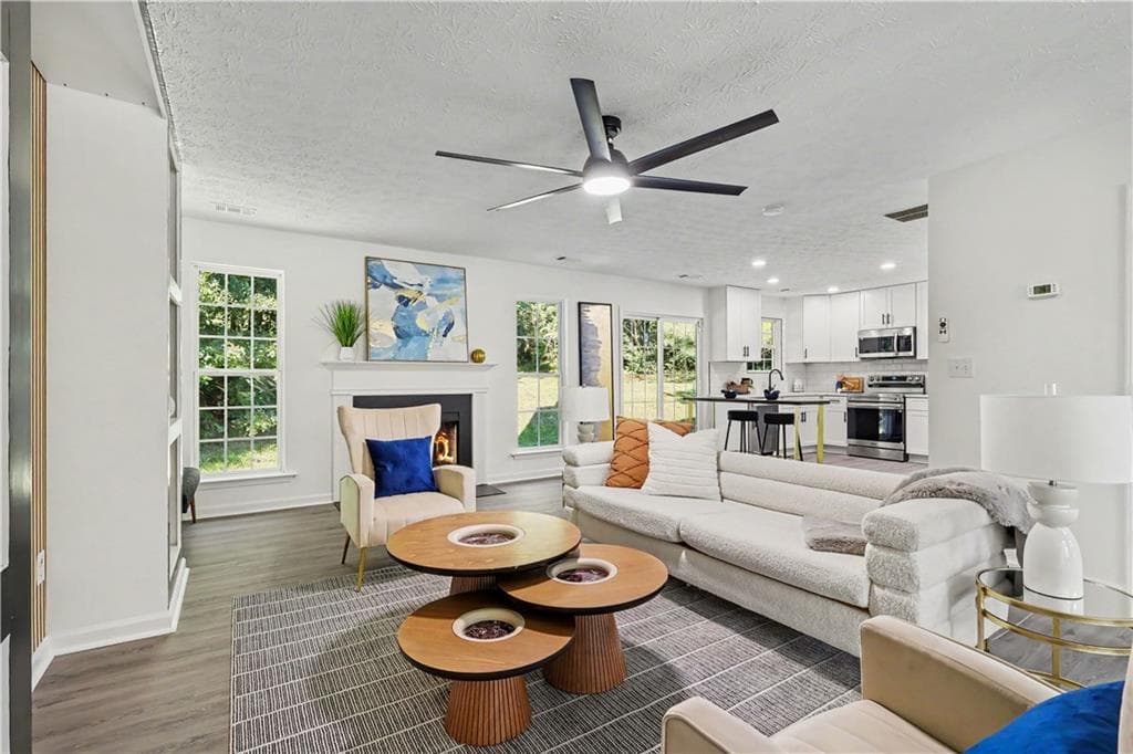 4 bedroom, 3 bathroom, 2,321 sq ft single family residence for sale at 680 Dot Drive, Atlanta, GA 30349 — photo 2