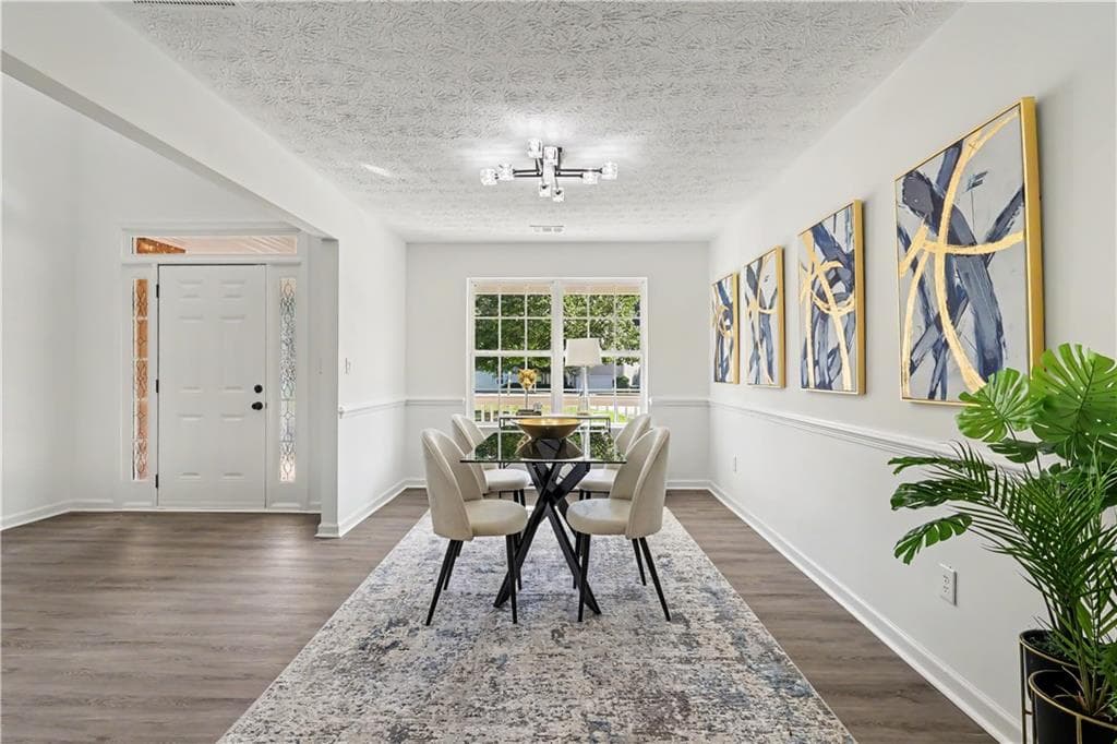 4 bedroom, 3 bathroom, 2,321 sq ft single family residence for sale at 680 Dot Drive, Atlanta, GA 30349 — photo 5