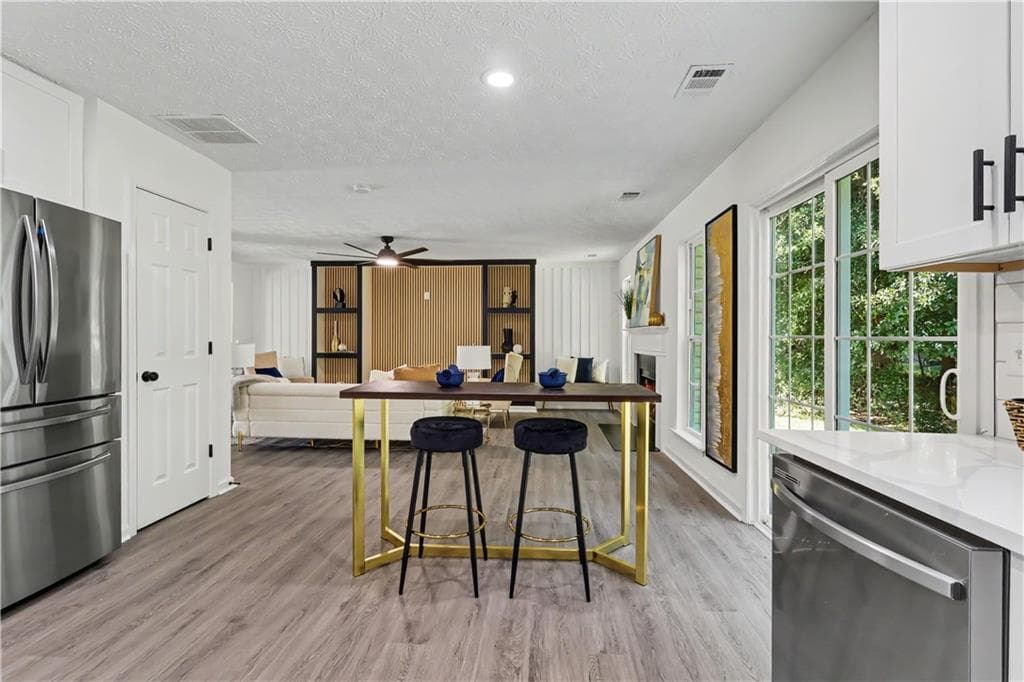 4 bedroom, 3 bathroom, 2,321 sq ft single family residence for sale at 680 Dot Drive, Atlanta, GA 30349 — photo 10