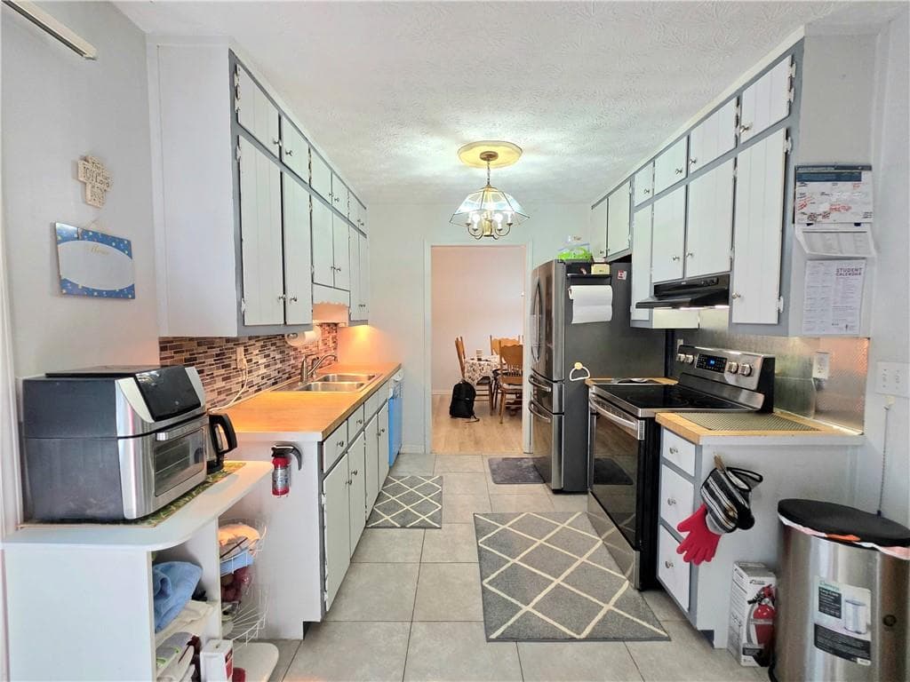 4 bedroom, 3 bathroom, 2,125 sq ft single family residence for sale at 692 Talemwood Court, Lawrenceville, GA 30044 — photo 8