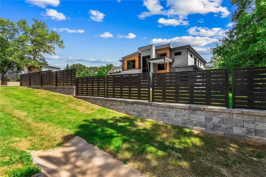 5 bedroom, 5 bathroom, 5,700 sq ft single family residence for sale at 5 Whitehead Road, Sugar Hill, GA 30518 — photo 5