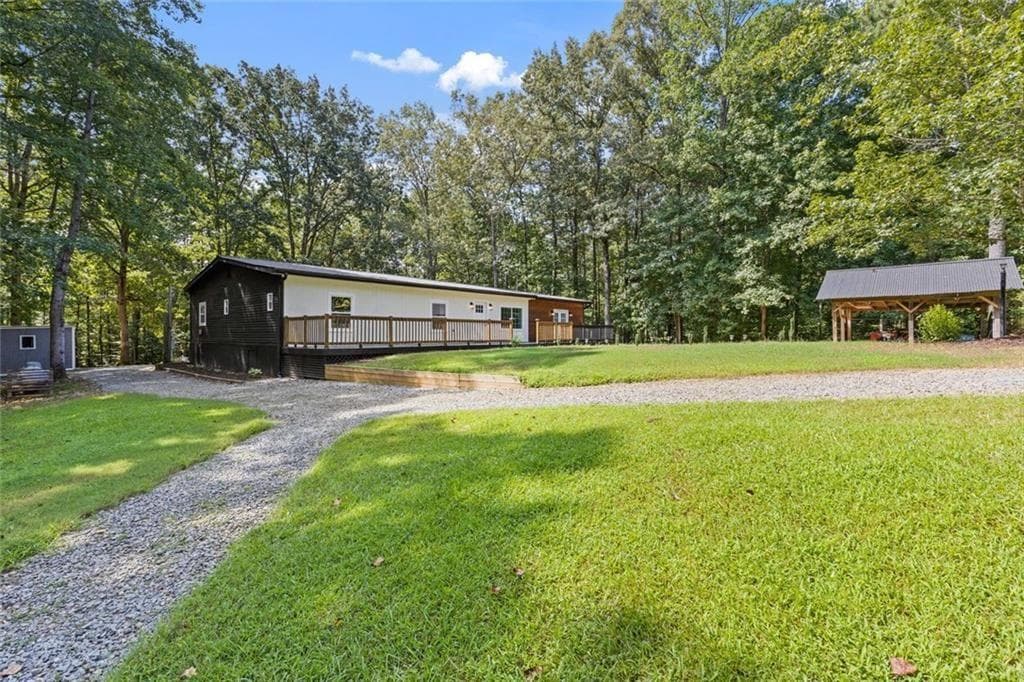 4 bedroom, 3 bathroom, 1,972 sq ft single family residence for sale at 681 Pumpkinvine Road, Acworth, GA 30101 — photo 2