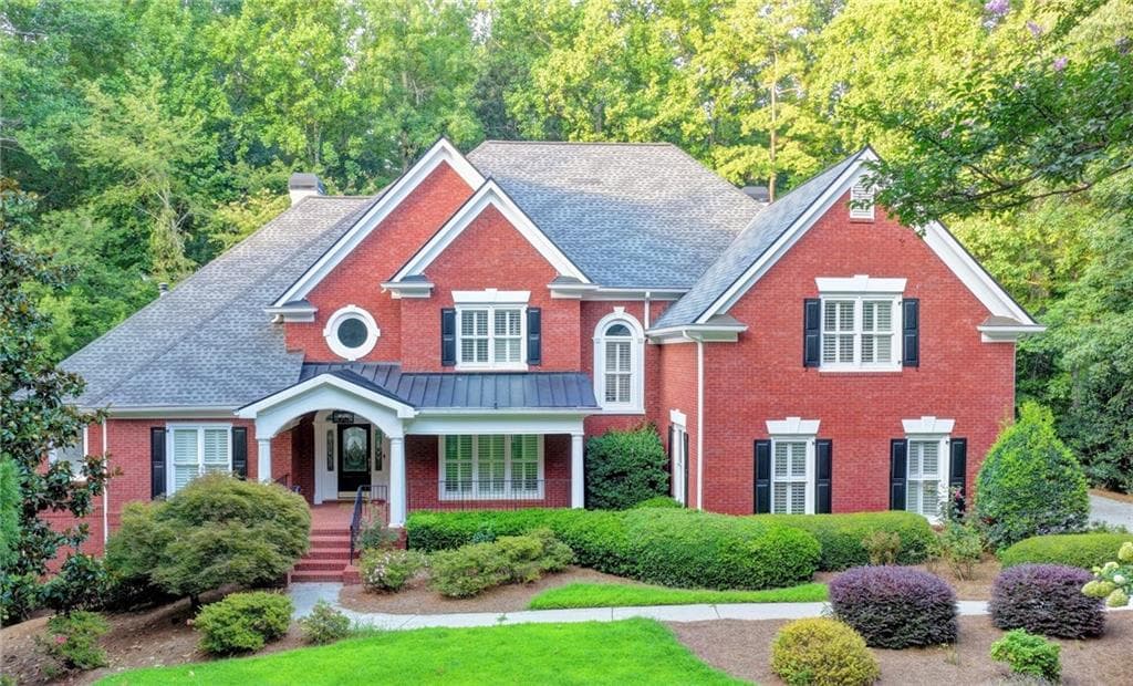 5 bedroom, 5 bathroom, 6,753 sq ft single family residence for sale at 7040 Laurel Oak Drive, Suwanee, GA 30024