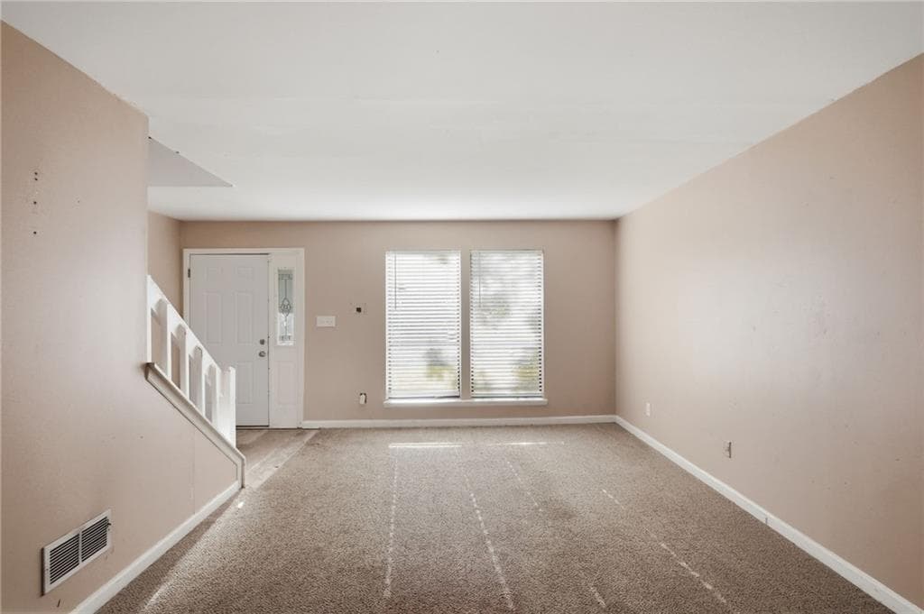 4 bedroom, 3 bathroom, 2,045 sq ft single family residence for sale at 1001 Chapman Lane, Stone Mountain, GA 30088 — photo 8