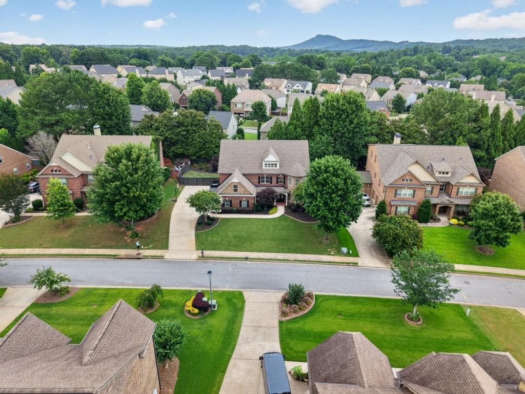 6 bedroom, 5 bathroom, 5,360 sq ft single family residence for sale at 5050 Savannah Run, Cumming, GA 30040 — photo 4