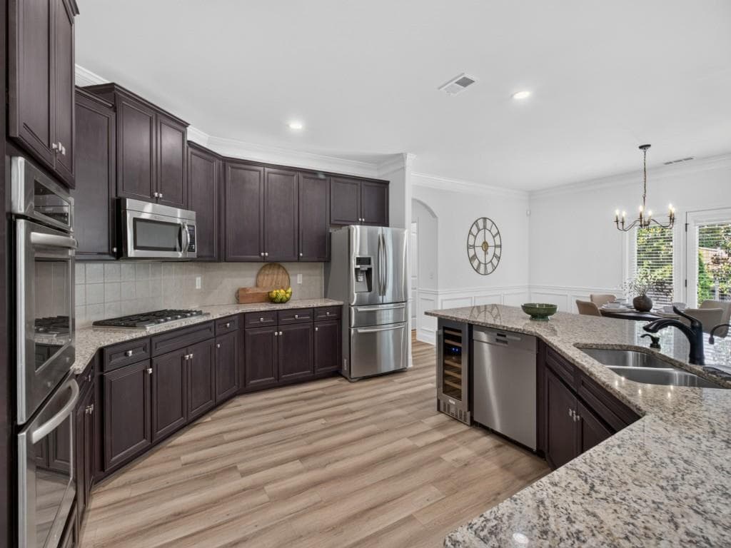 6 bedroom, 5 bathroom, 5,360 sq ft single family residence for sale at 5050 Savannah Run, Cumming, GA 30040 — photo 10