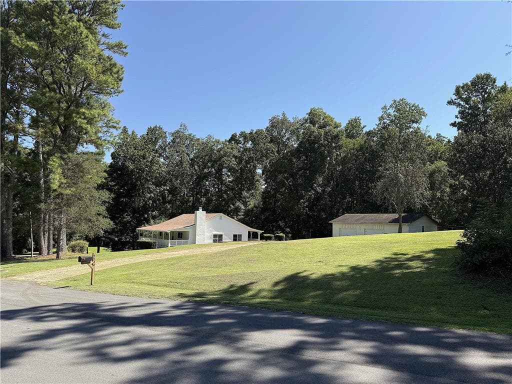 2 bedroom, 1 bathroom, 1,632 sq ft single family residence under contract at 5730 Westwood Drive, Cumming, GA 30040 — photo 2