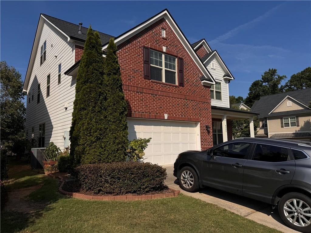 6 bedroom, 5 bathroom, 3,654 sq ft single family residence for sale at 4502 Thach Avenue, Sugar Hill, GA 30518 — photo 2