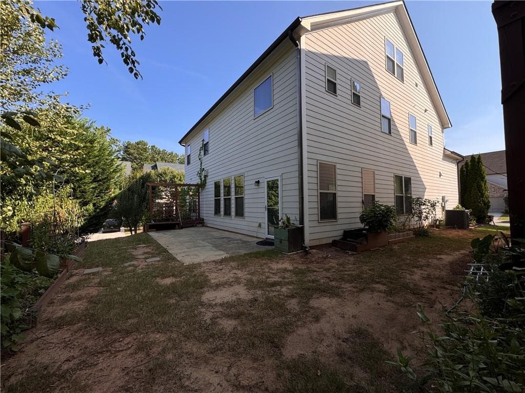 6 bedroom, 5 bathroom, 3,654 sq ft single family residence for sale at 4502 Thach Avenue, Sugar Hill, GA 30518 — photo 3
