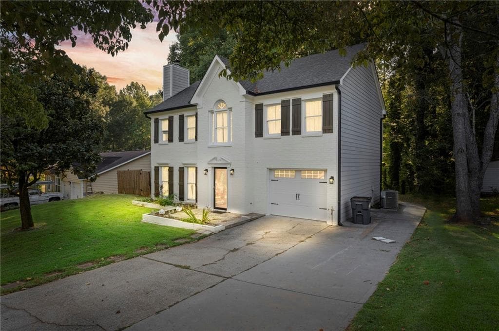 4 bedroom, 4 bathroom, 2,314 sq ft single family residence for sale at 661 Sunfield Drive, Lilburn, GA 30047
