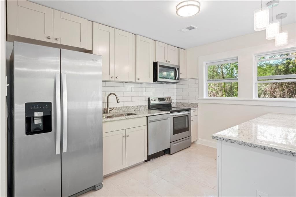 4 bedroom, 3 bathroom, 1,850 sq ft single family residence for sale at 3155 Delmar Lane, Atlanta, GA 30311 — photo 6