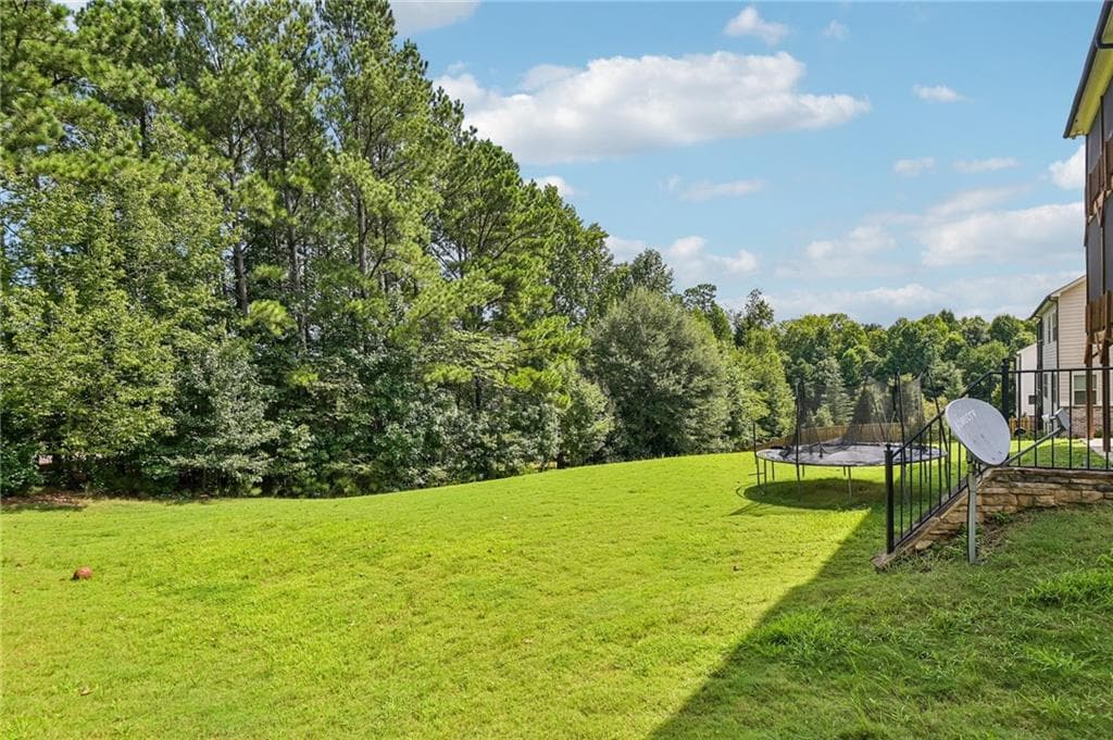 6 bedroom, 6 bathroom, 5,149 sq ft single family residence for sale at 606 Taymack, Woodstock, GA 30188 — photo 8