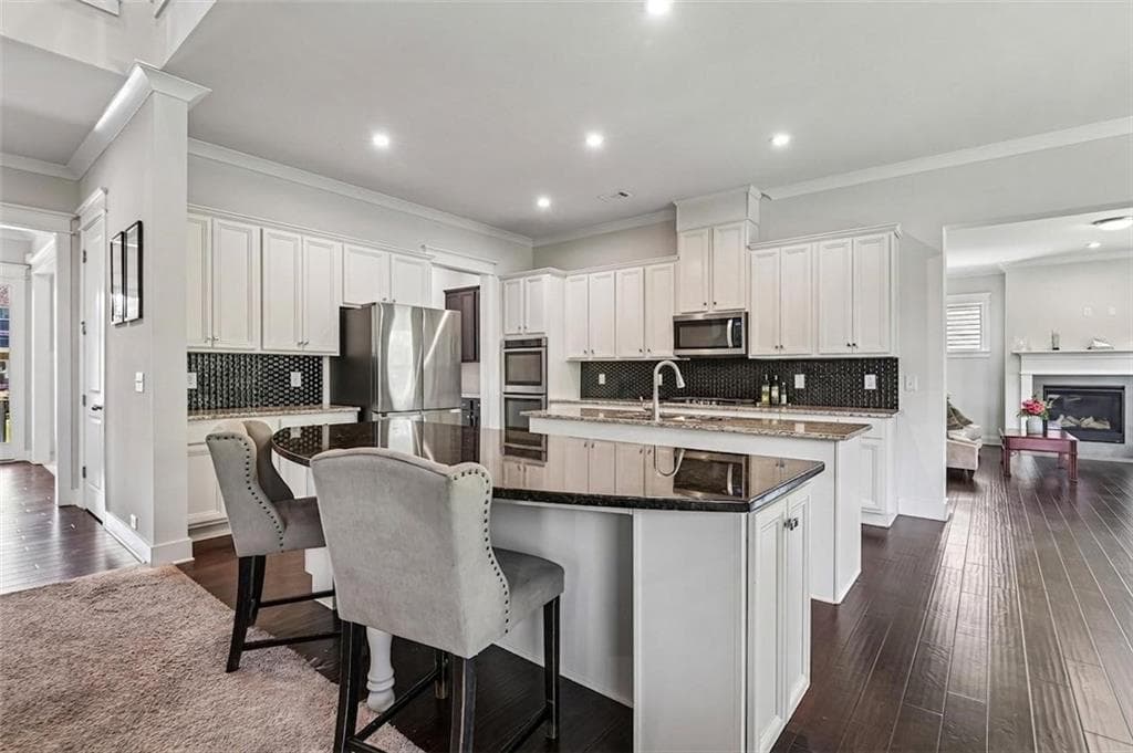 6 bedroom, 6 bathroom, 5,149 sq ft single family residence for sale at 606 Taymack, Woodstock, GA 30188 — photo 2