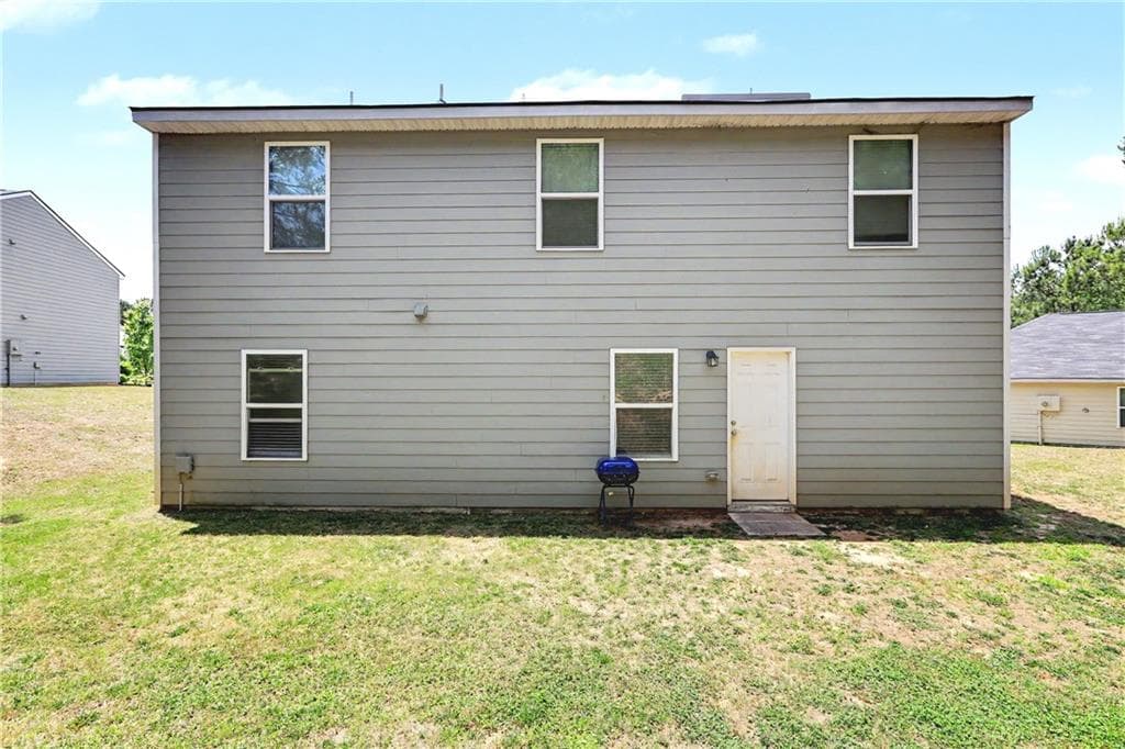 4 bedroom, 3 bathroom, 1,876 sq ft single family residence for sale at 1777 Robinson Court, Griffin, GA 30224 — photo 2