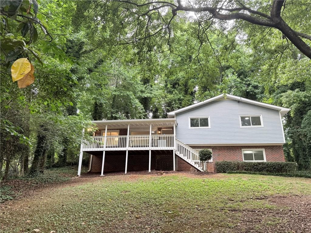 4 bedroom, 3 bathroom, 2,072 sq ft home for sale at 5641 Stone Court, Stone Mountain, GA