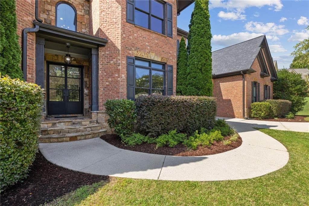 6 bedroom, 7 bathroom, 8,116 sq ft single family residence for sale at 4824 Deer Creek Court, Flowery Branch, GA 30542 — photo 2