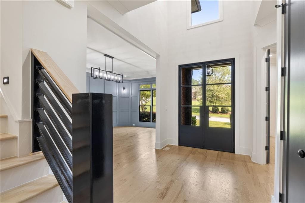 6 bedroom, 7 bathroom, 8,116 sq ft single family residence for sale at 4824 Deer Creek Court, Flowery Branch, GA 30542 — photo 3