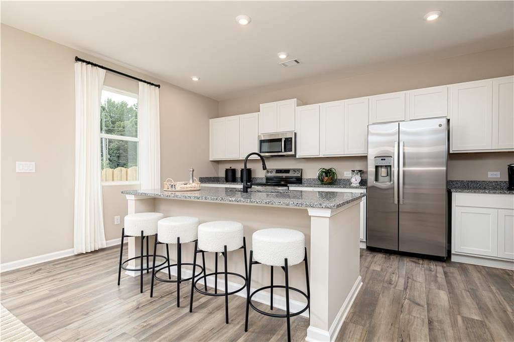 4 bedroom, 3 bathroom, 2,455 sq ft single family residence for sale at 5 Hickory Grove Avenue, Lawrenceville, GA 30046 — photo 6