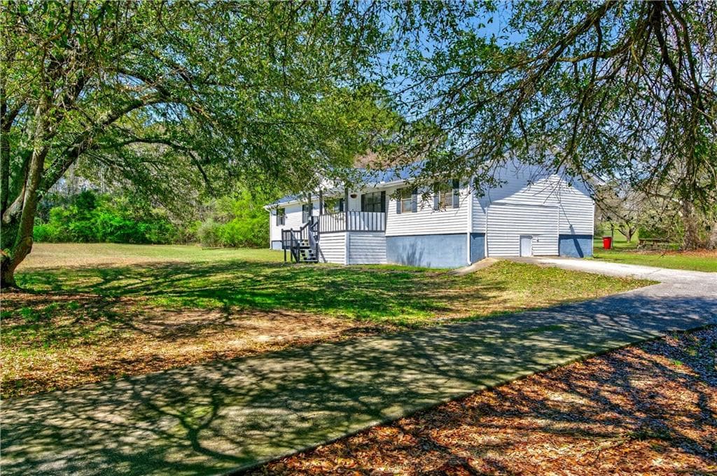 4 bedroom, 2 bathroom, 3,078 sq ft single family residence for sale at 5 Hearthstone Drive, Stockbridge, GA 30281 — photo 3