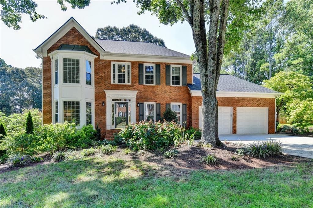 5 bedroom, 4 bathroom, 3,856 sq ft single family residence for sale at 311 Ashbourne Trail, Lawrenceville, GA 30043 — photo 2