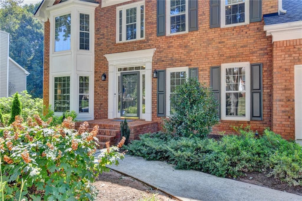 5 bedroom, 4 bathroom, 3,856 sq ft single family residence for sale at 311 Ashbourne Trail, Lawrenceville, GA 30043 — photo 3
