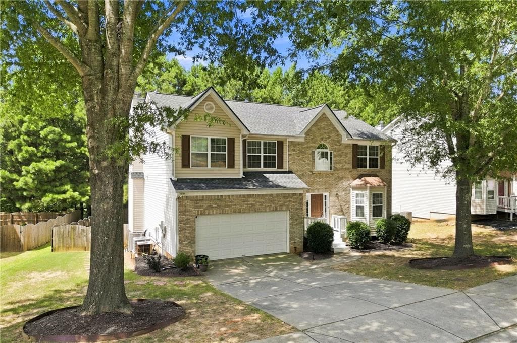 5 bedroom, 4 bathroom, 3,658 sq ft single family residence for sale at 5492 Skylar Creek Lane, Buford, GA 30518 — photo 2