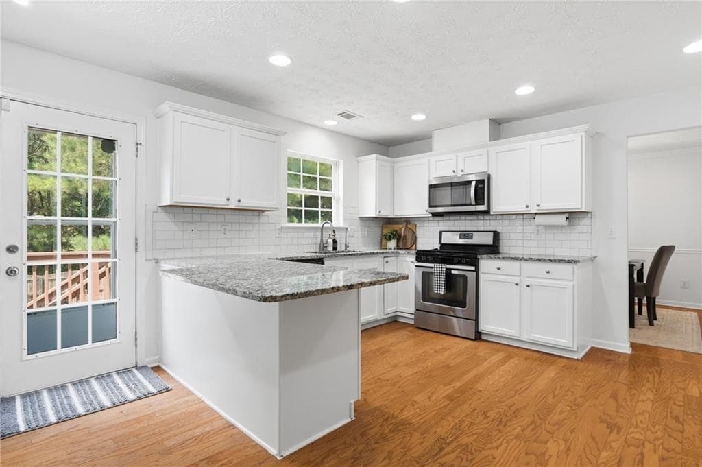 5 bedroom, 4 bathroom, 3,658 sq ft single family residence for sale at 5492 Skylar Creek Lane, Buford, GA 30518 — photo 10