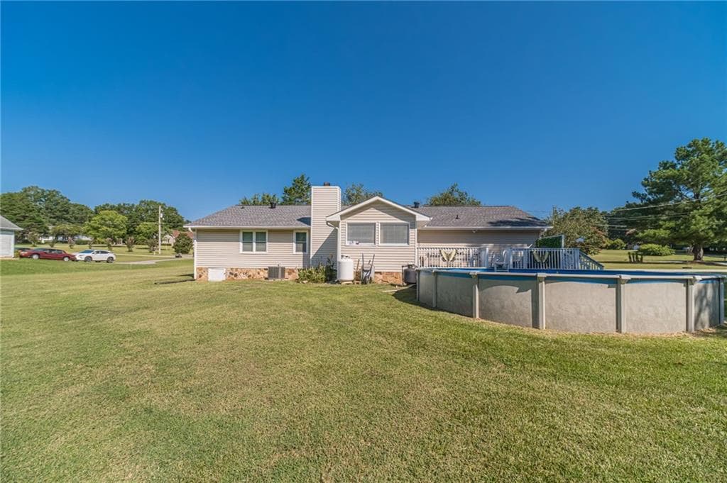 3 bedroom, 2 bathroom, 1,589 sq ft single family residence for sale at 3520 Camelot Court, Loganville, GA 30052 — photo 2