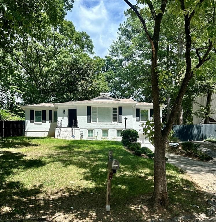 4 bedroom, 3 bathroom, 2,050 sq ft single family residence for sale at 1821 Fernwood Road, Atlanta, GA 30318 — photo 1 of 21