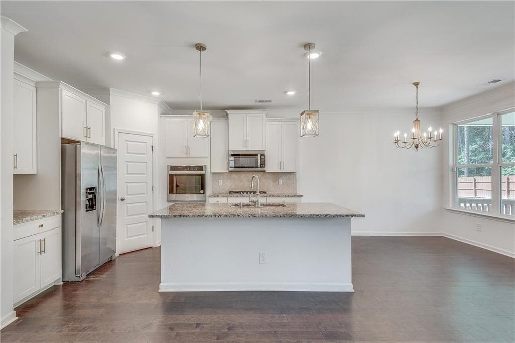 5 bedroom, 3 bathroom, 2,534 sq ft single family residence for sale at 1440 Trident Maple, Lawrenceville, GA 30045 — photo 9