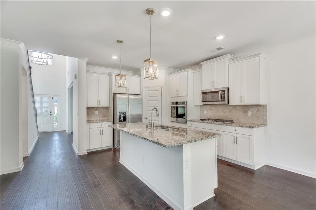 5 bedroom, 3 bathroom, 2,534 sq ft single family residence for sale at 1440 Trident Maple, Lawrenceville, GA 30045 — photo 10