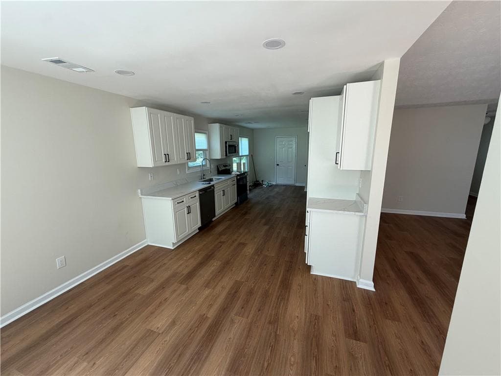 4 bedroom, 2 bathroom, 1,650 sq ft single family residence for rent at 2694 Palm Creek Court, Dacula, GA 30019 for $2,550 a month — photo 2